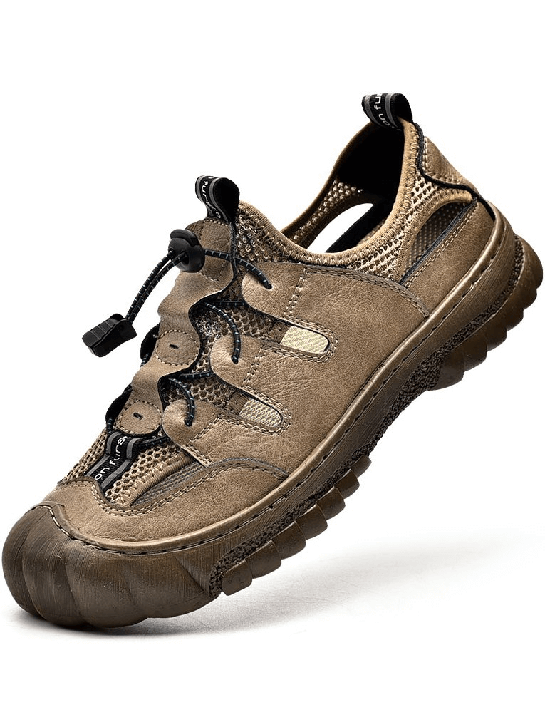 Mesh breathable men's sandals with flexible sole and cow leather upper, showcasing comfort and style for outdoor adventures.
